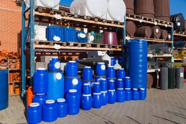 New plastic tanks and barrels of various capacities and volumes clipart