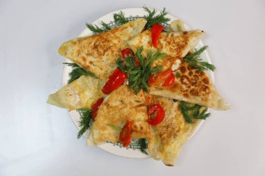 İtalyan pizzası panzerotti veya panzarotti. Çeşitli lezzetli dolgulara sahip hamur işleri, İtalya 'da ve Amerika Birleşik Devletleri' nde özellikle Güney New Jersey 'de çok popülerdir..