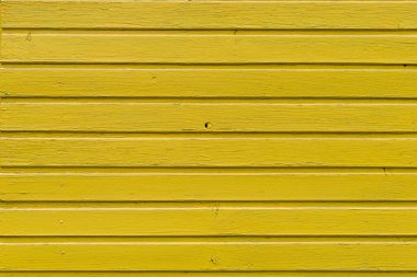 Eski pürüzlü ahşap kaplama yüzey, son moda sarı. Bir tasarımcı için tasarım veya grafik kaynağı için arkaplan veya şablon.