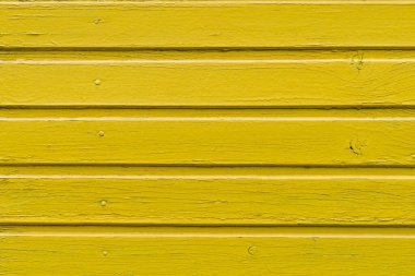Eski pürüzlü ahşap kaplama yüzey, son moda sarı. Bir tasarımcı için tasarım veya grafik kaynağı için arkaplan veya şablon.