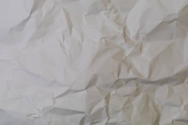 Tasarım için boşluk veya metin için kopyalama alanı olarak ağır buruşuk kağıt arkaplan.