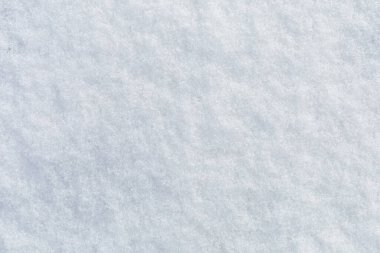 Kışın karla kaplı yüzey. Tasarım için arkaplan veya grafik kaynak. Boşluk