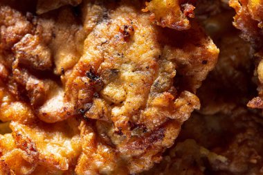 Meat in batter. Home cooking or culinary background abstract. Homemade dish.