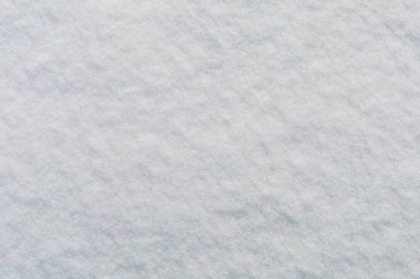Kışın karla kaplı yüzey. Tasarım için arkaplan veya grafik kaynak. Boşluk