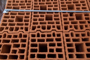 Boş tuğla. Sıcak enerji tasarruflu ve çevre dostu doğal yapı malzemesi. Arkaplan