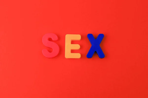 The word or text Sex written in the alphabet with colorful letters on a magnet.