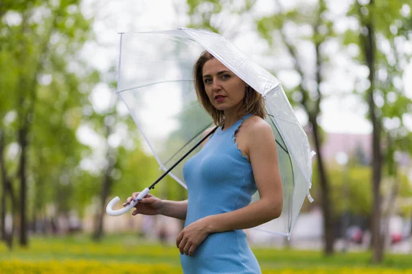 Young Woman Transparent Umbrella Blurred Background City Park Copy Space — Stock Photo, Image