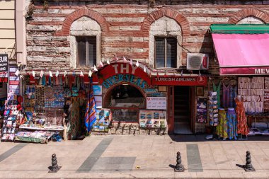 Street view of turkish souvenir shop with colorful display and flags. August 12, 2025 Istanbul Turkey.