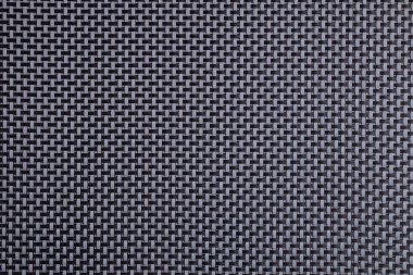 Ayrıntılı gri ve siyah örülmüş desen arkaplanı.