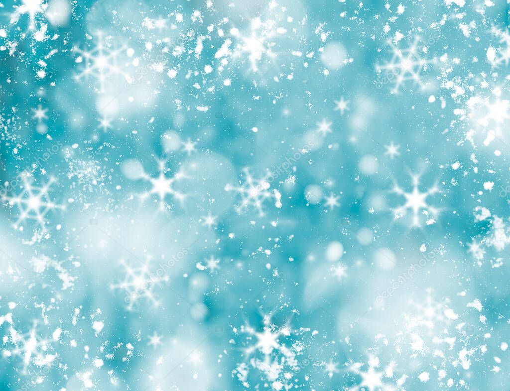 Blue abstract winter background. Snowflakes and snow with bokeh effect.