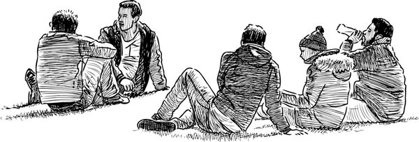 Люди на траве в городском парке
