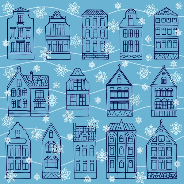 Seamless pattern with houses and flakes of snow
