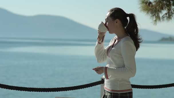 Young Girl Drinking a Cappuccino On Vacation — Stock Video