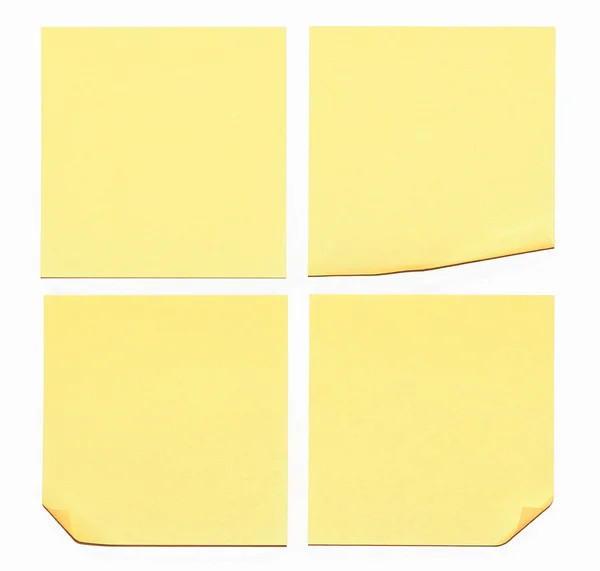 Κίτρινες κολλώδεις σημειώσεις σε άσπρο φόντο — Φωτογραφία Αρχείου