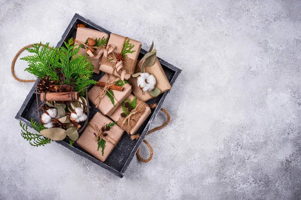 Christmas gift boxes in craft paper — Stock Photo, Image