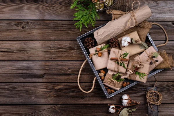 Christmas gift boxes in craft paper — Stock Photo, Image