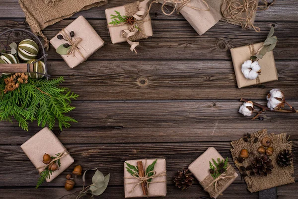 Christmas gift boxes in craft paper — Stock Photo, Image