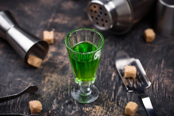 Glass with Green Absinthe. a Small Shot Glass with Green Liquid Stock Image  - Image of glass, drink: 124266747