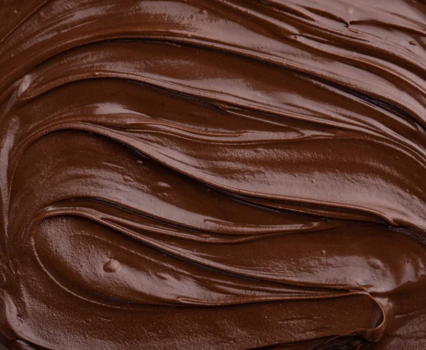 Food texture of melted chocolate or spread.