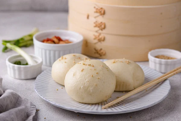 Chinese steamed buns baozi with steamer — Stock Photo, Image