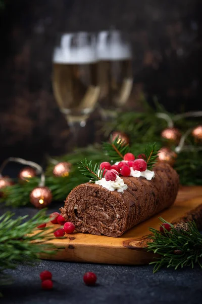 Christmas chocolate roll cake with cream — Stock Photo, Image