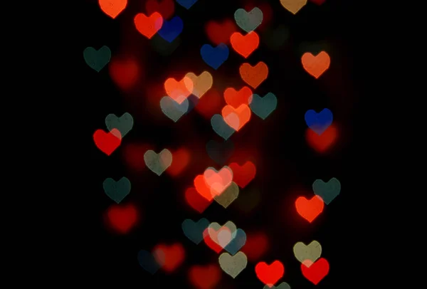 Abstract festive heart bokeh background