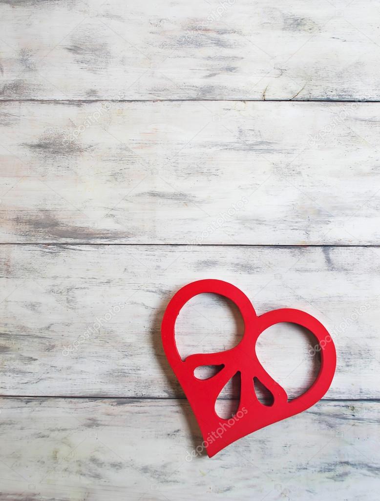 Valentines background with wooden heart