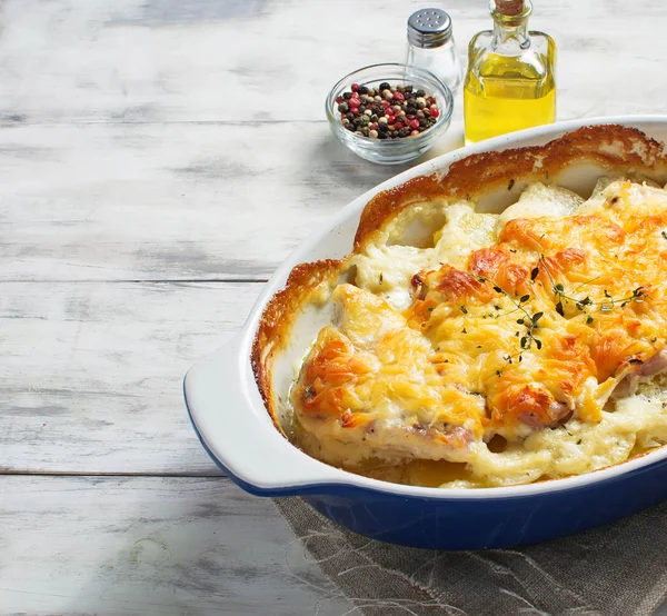 Baked meat with potatoes and cheese — Stock Photo, Image