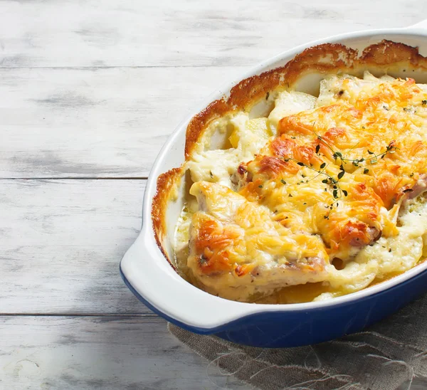 Baked meat with potatoes and cheese — Stock Photo, Image