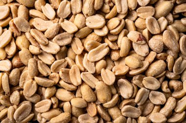 Fıstık arkaplanı. Fıstık ezmesi. Kahverengi renk.