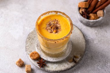 Autumn hot drink spicy pumpkin smoothie or latte