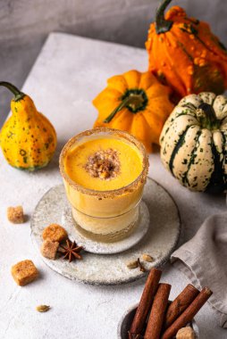 Autumn hot drink spicy pumpkin smoothie or latte