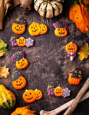 Halloween cookies in shape of pumpkin jack-o-lantern