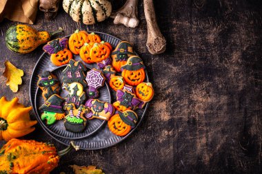 Halloween cookies in shape of pumpkin jack-o-lantern