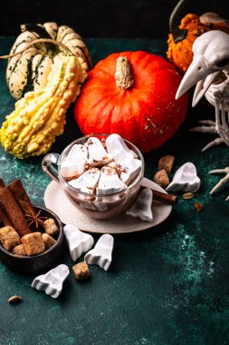 Halloween hot chocolat or cocoa with marshmellow in shape of ghost