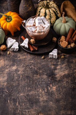 Halloween hot chocolat or cocoa with marshmellow in shape of ghost
