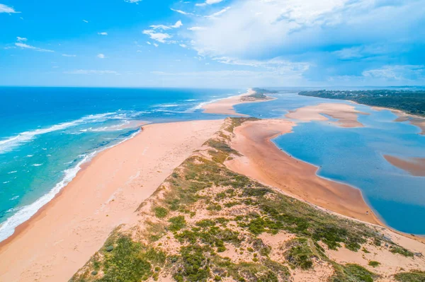 Scenic aerial landscape of ocean inlet and river mouth in Victoria, Australia
