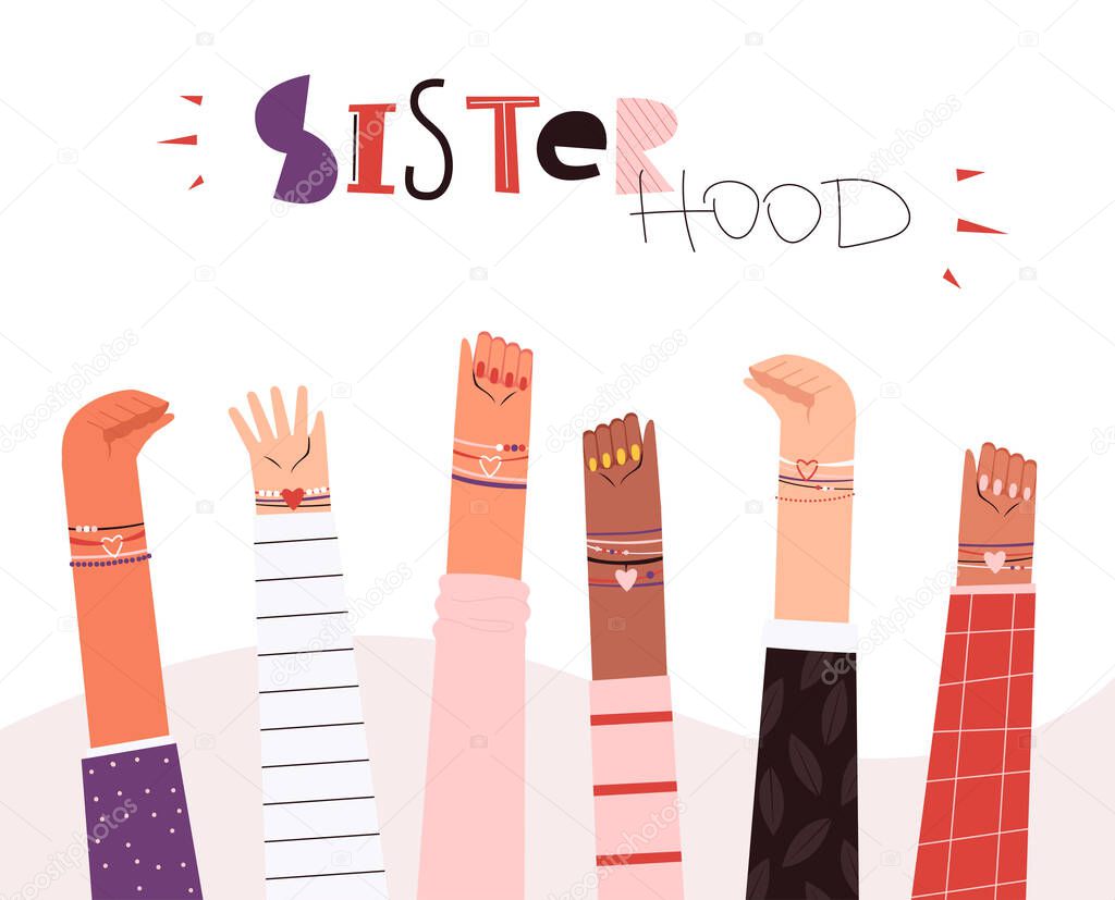 The hands of women of different nationalities in friendship bracelets are clenched in a fist and show their strength
