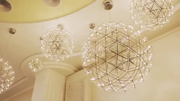 Chandeliers Shape Spheres Made Beige Mesh Different Sizes Hanging Different — Stock Video