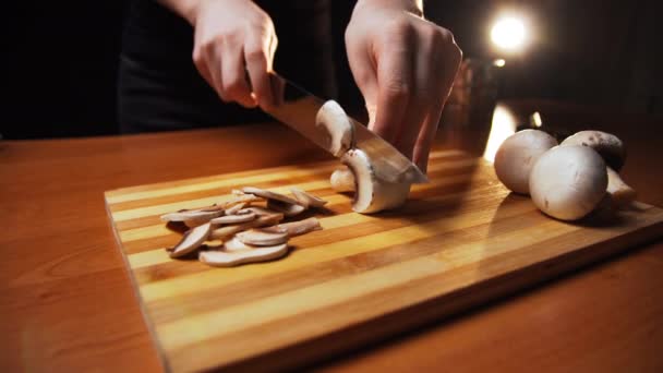 Woman Cook Black Uniform Takes Kitchen Tool Metal Sharp Knife — Stock Video