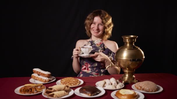 Caucasian Girl Sits Table Samovar Delicious Desserts Pastries Drinks Tea — Stock Video