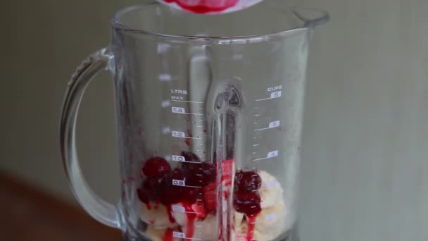 Milk cherry-banana yogurt — Stock Video