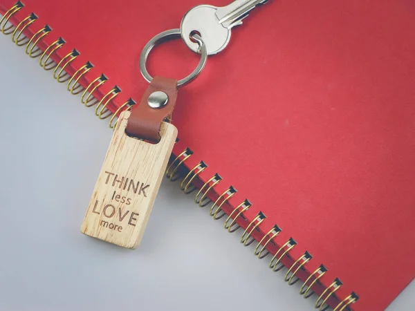 Close Image Wooden Keyring Word Think Less Love More Red — Stock Photo, Image