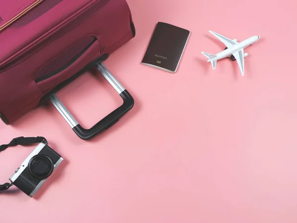 Top View Flat Lay Airplane Model Passport Camera Pink Suitcase — Stock Photo, Image