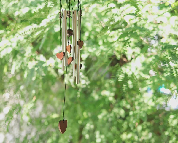 Wind Chime Wooden Herat Shape Hanging Garden Green Leaves Background — Stock Photo, Image