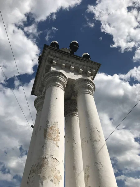 antique whites column architecture, sky and clouds.