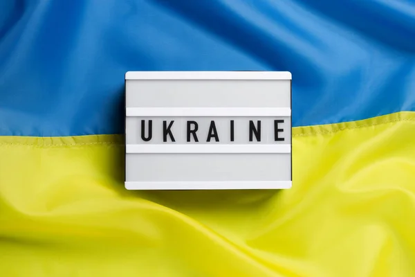 Лампа Текстом Украина Фоне Флага — стоковое фото