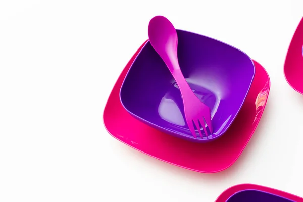 Purple Plastic Plates Forks Spoon Bluish Background — Stock Photo, Image