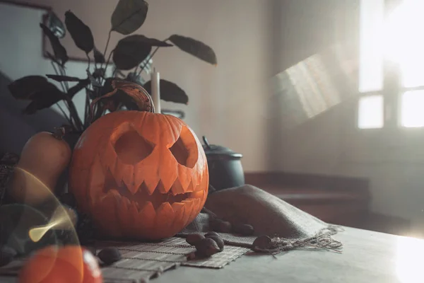 Halloween Spooky Pumpkin Face Candle Lit Table Sun Light Skeleton — Stock Photo, Image