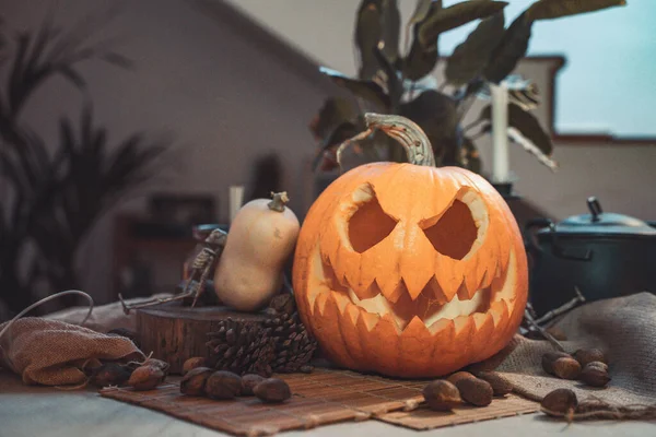 Halloween Spooky Pumpkin Face Table Decoration Skeleton Candles Nuts Teal — Stock Photo, Image